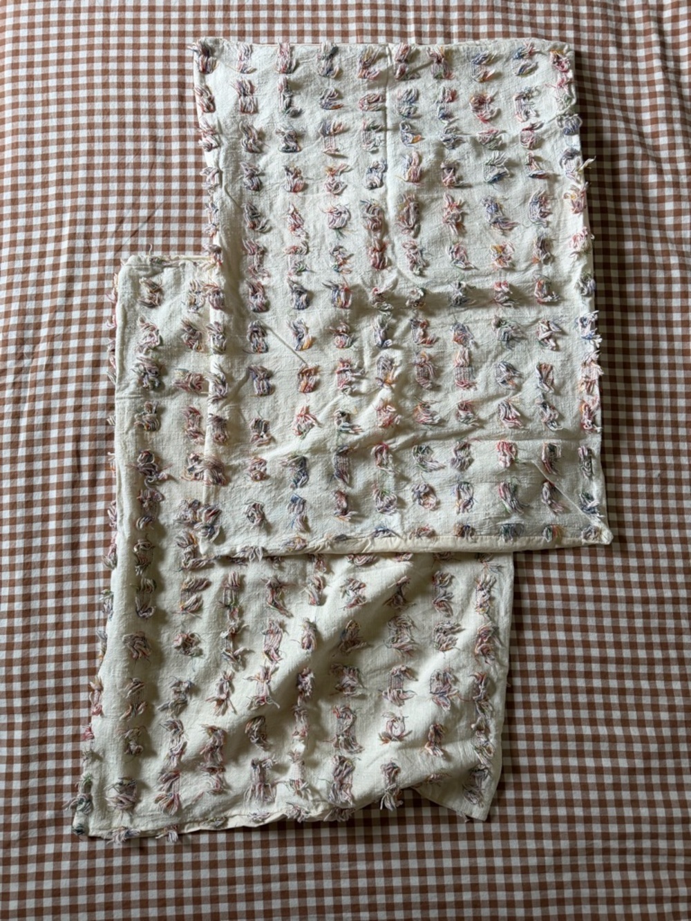 Urban Outfitters Ivory Tufted Throw with Pastel Knots